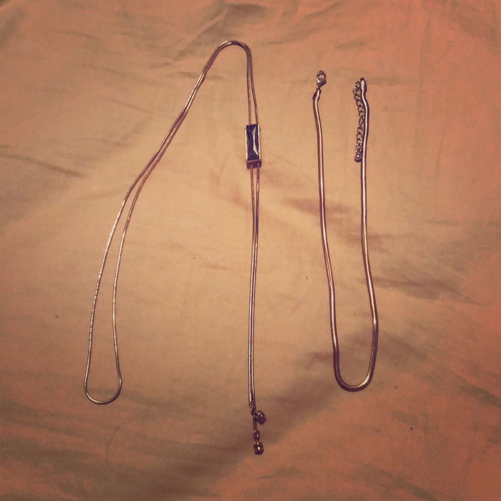 Set of long gold necklaces